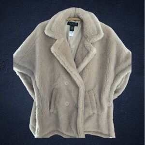 Rachel Zoe Teddy Bear Sherpa Sleeveless cape-style, double breasted, faux fur.